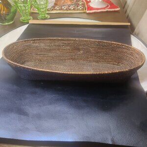 Woven bread basket is long and rectangular oval shape. The weave is exceptional